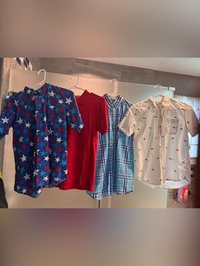 Set of 4 boys shirts. Sizes XL (14/16) L (14/16) and XL (14).